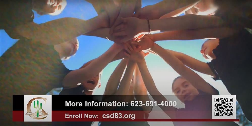  Cartwright students touching hands in celebration